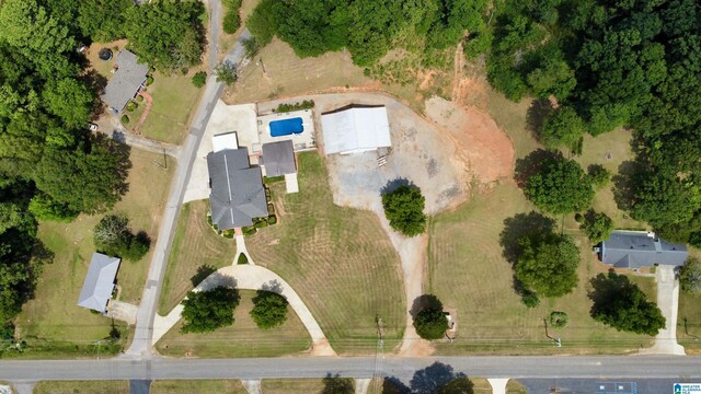 birds eye view of property with a rural view