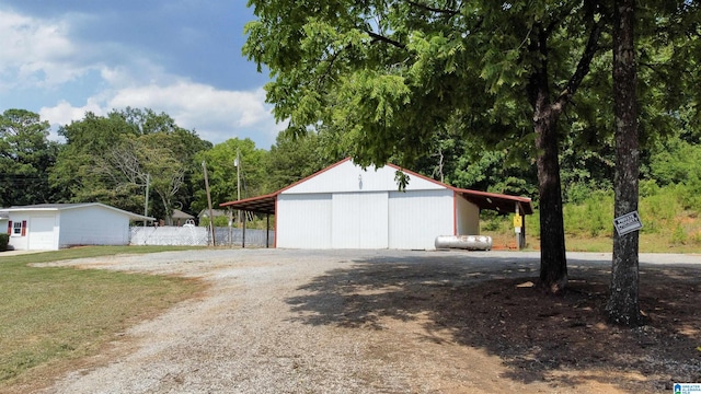 garage with a carport