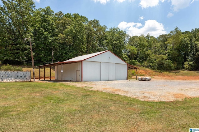 garage featuring a yard