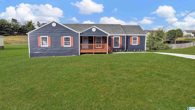 single story home featuring a front lawn