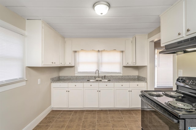 kitchen featuring white cabinetry, sink, electric range, and tile patterned flooring