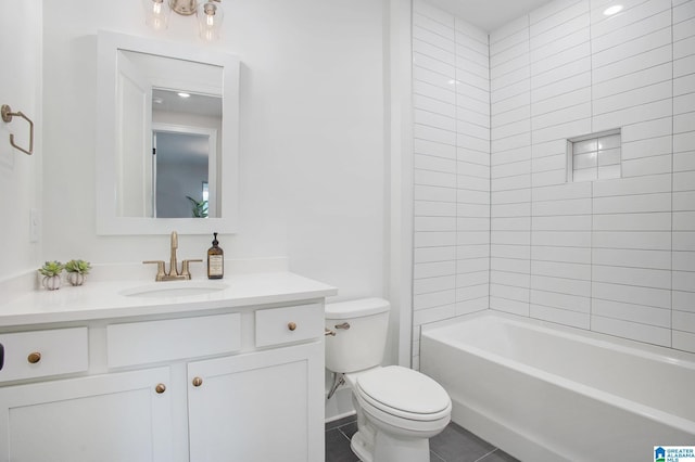 full bath featuring toilet, tile patterned floors, tub / shower combination, and vanity