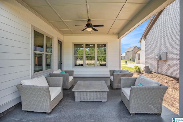 view of patio with ceiling fan and an outdoor hangout area