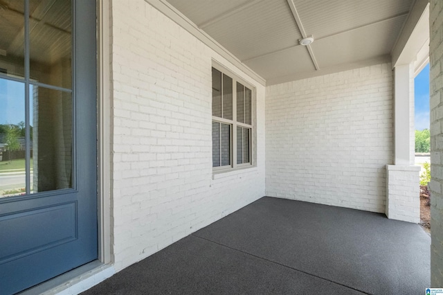 view of patio / terrace featuring ceiling fan