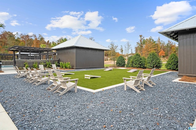 view of yard with an outbuilding and a patio area