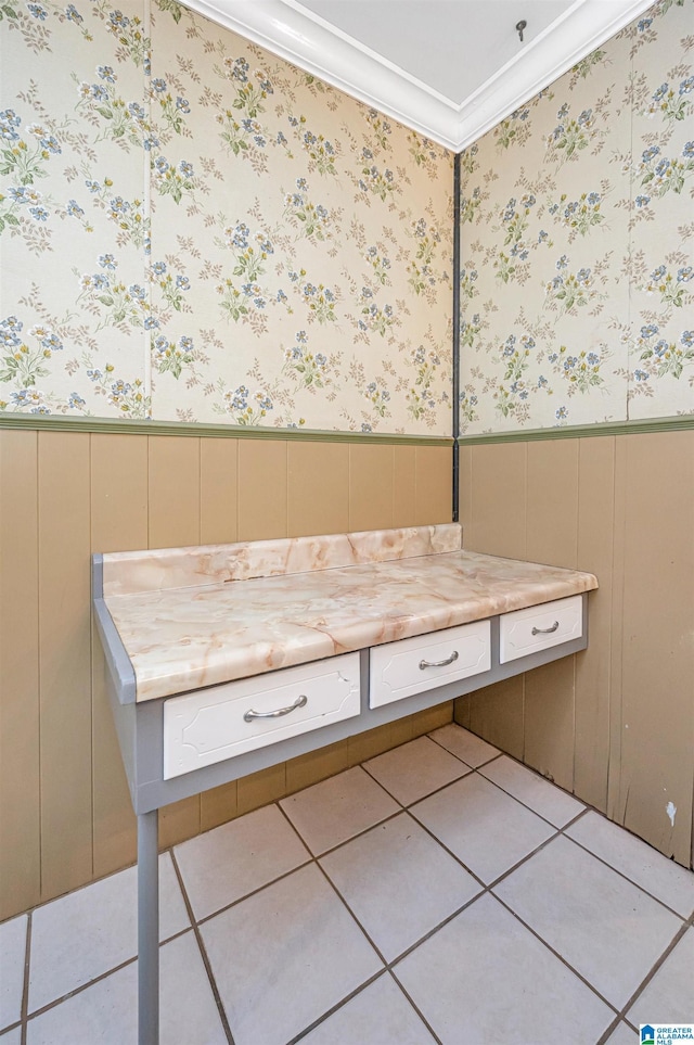 bathroom with tile patterned flooring and ornamental molding