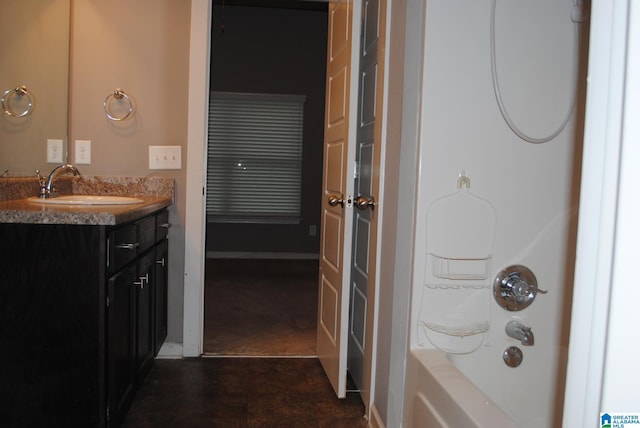 bathroom featuring vanity and shower / bathtub combination