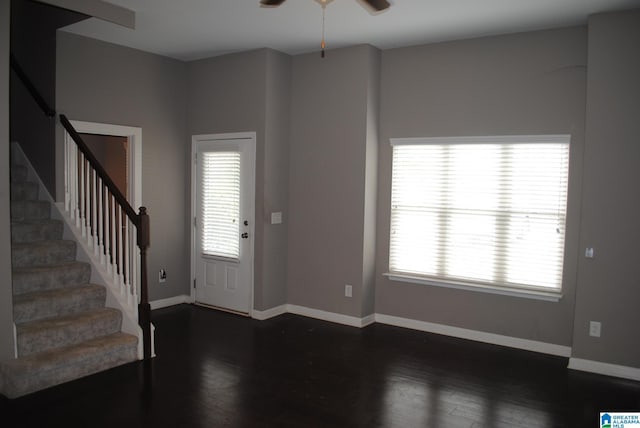 entryway with ceiling fan and dark hardwood / wood-style flooring