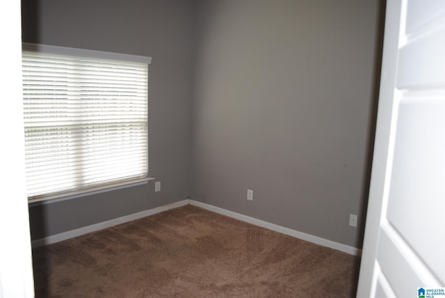 view of carpeted spare room