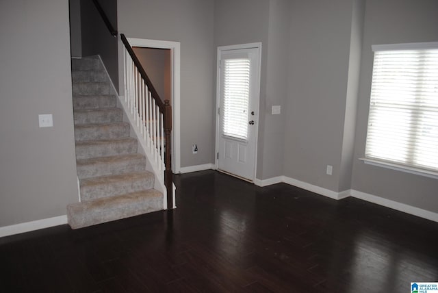 entrance foyer featuring dark hardwood / wood-style flooring