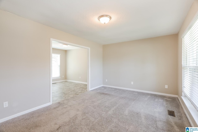 view of carpeted spare room