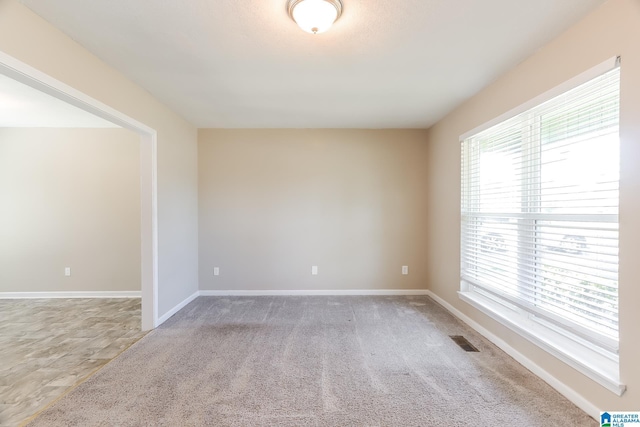 view of carpeted spare room