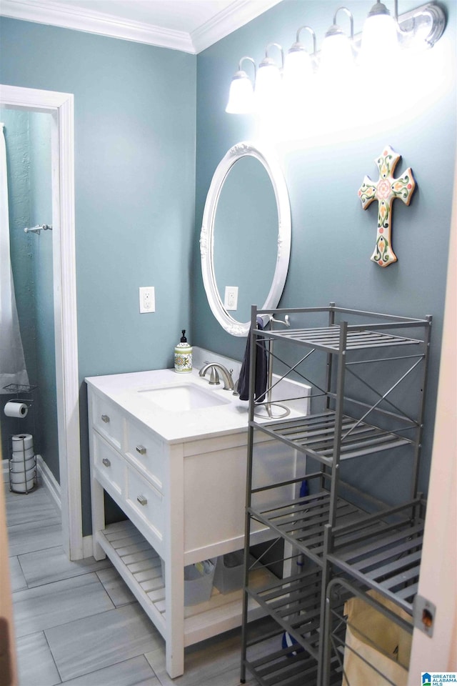 bathroom with vanity and crown molding