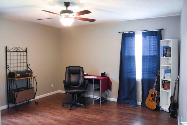 office area with a wealth of natural light, dark wood-style flooring, and baseboards