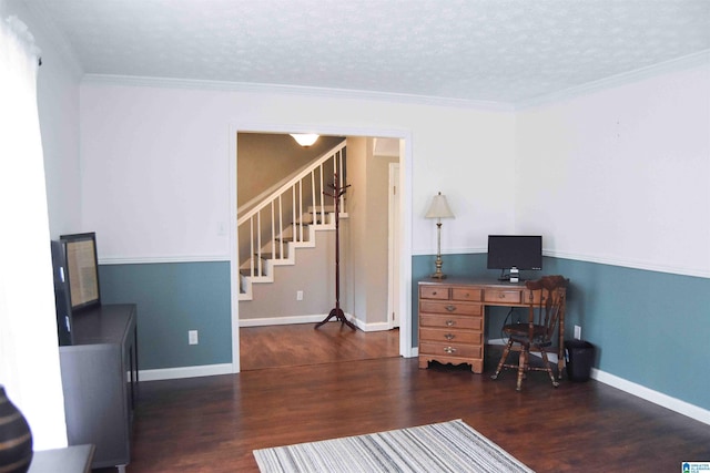 office space with a textured ceiling, dark wood-style flooring, baseboards, and crown molding