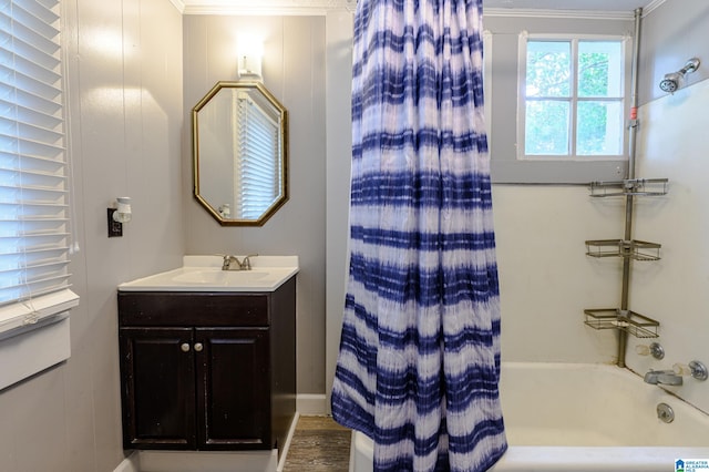 bathroom with vanity, shower / bath combo, and crown molding