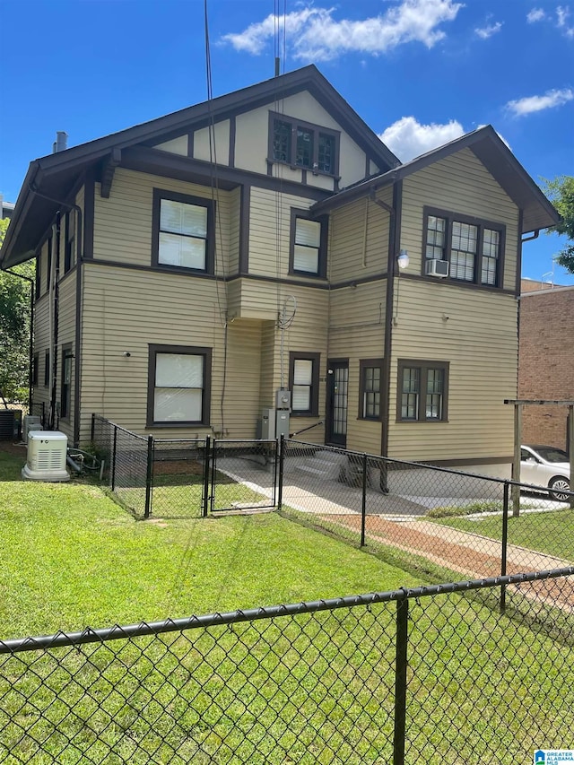 exterior space with cooling unit and a lawn