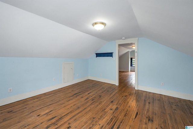 bonus room featuring hardwood / wood-style floors and vaulted ceiling