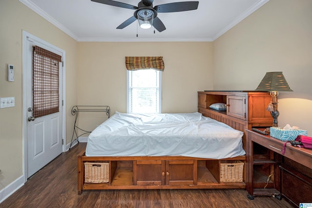 bedroom featuring dark hardwood / wood-style flooring, ornamental molding, and ceiling fan