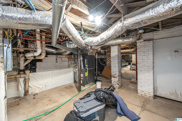 basement featuring heating unit