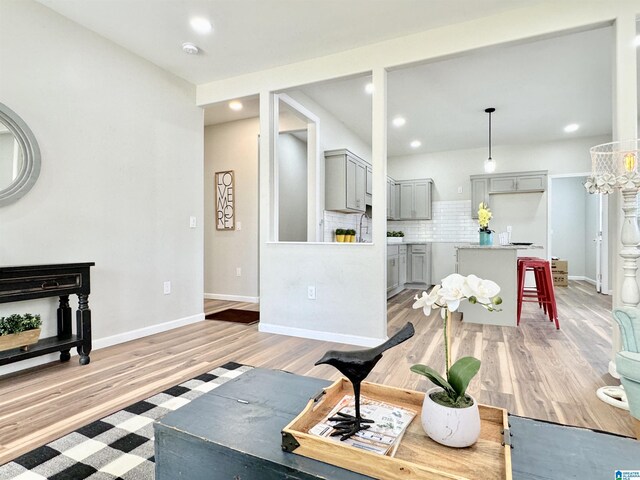 living room with light hardwood / wood-style flooring