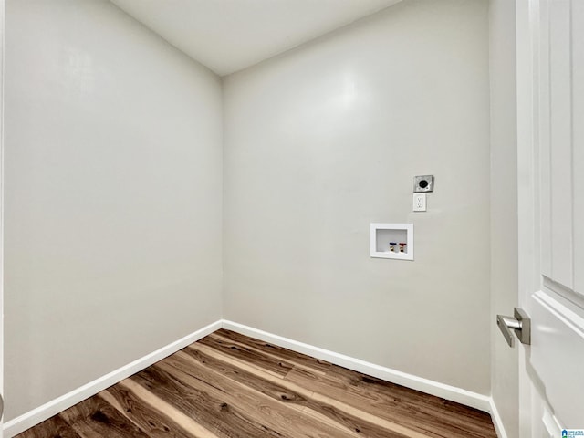 laundry area featuring hookup for a washing machine, hardwood / wood-style floors, and hookup for an electric dryer