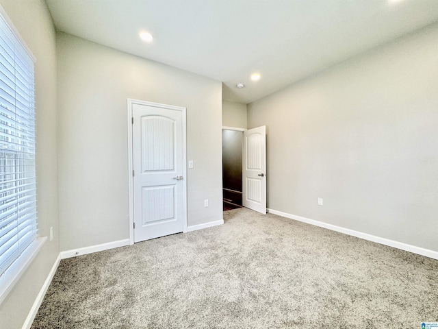 unfurnished bedroom featuring carpet floors