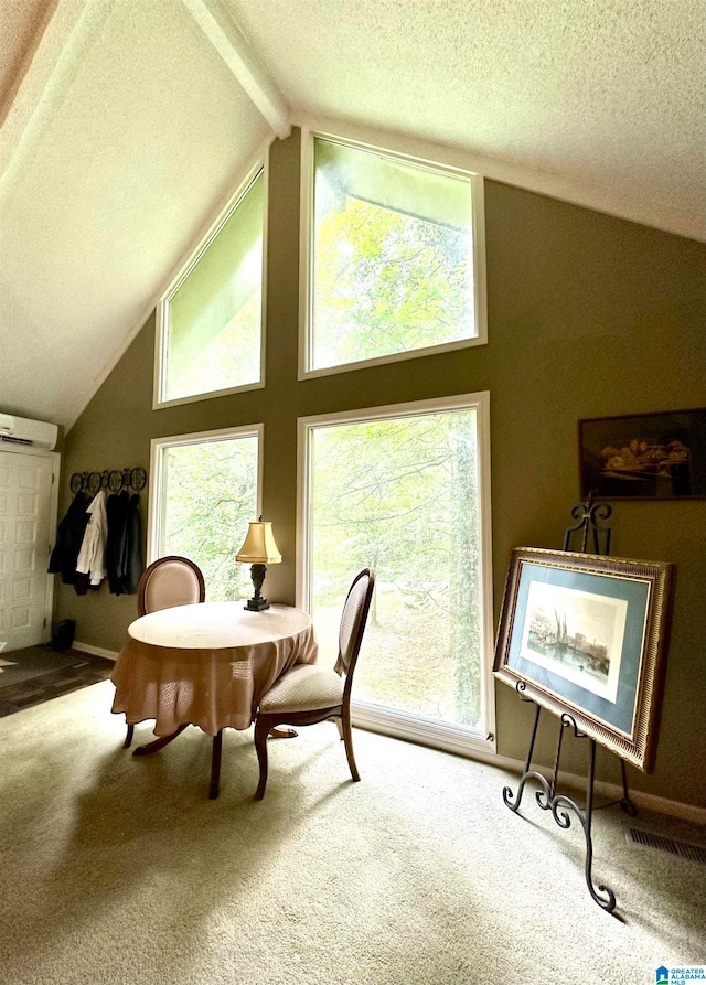 dining space featuring carpet and a wealth of natural light