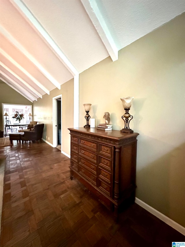 corridor with lofted ceiling with beams and dark parquet flooring