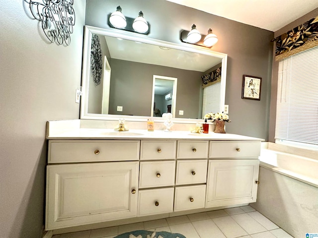 bathroom featuring dual vanity and tile patterned floors