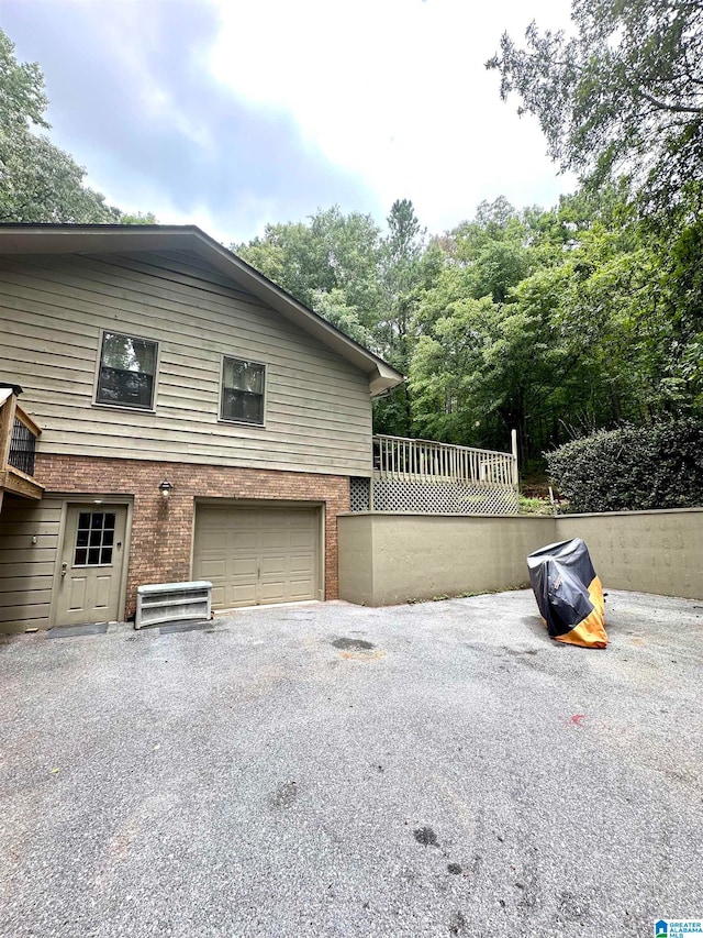 view of home's exterior with a garage