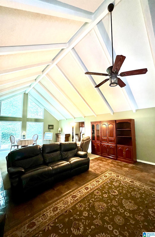 living room featuring high vaulted ceiling, beamed ceiling, and ceiling fan