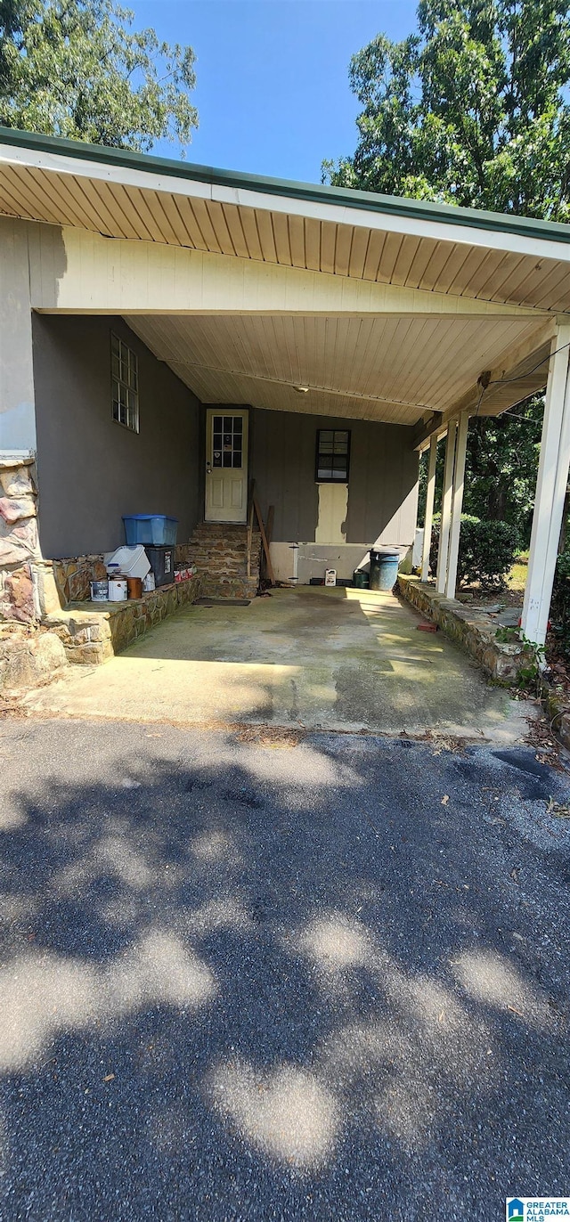 view of parking featuring a carport