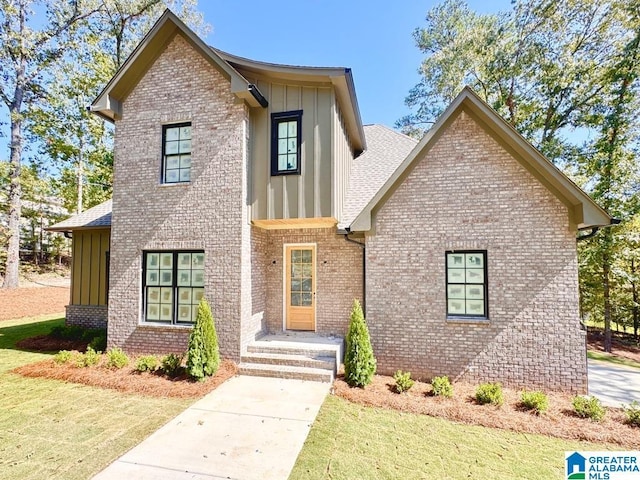 view of front of home with a front yard