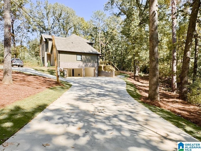 view of property exterior featuring a garage