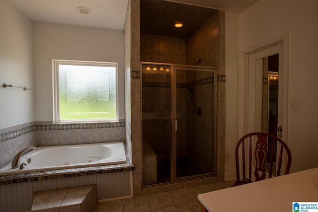 bathroom featuring tile patterned floors and plus walk in shower