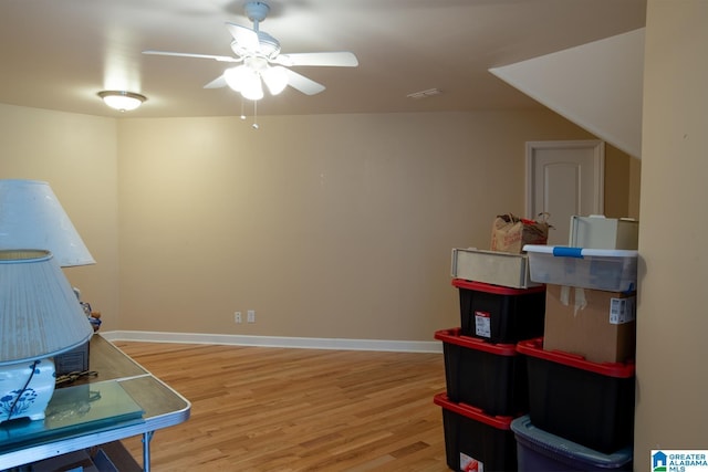 recreation room featuring hardwood / wood-style flooring and ceiling fan