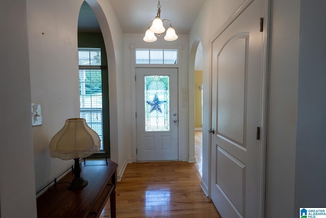 doorway to outside featuring light hardwood / wood-style flooring