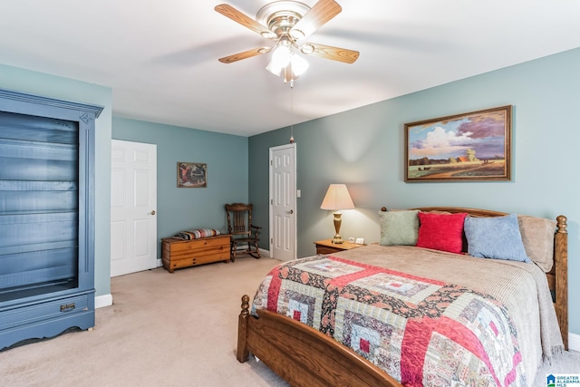 carpeted bedroom featuring ceiling fan