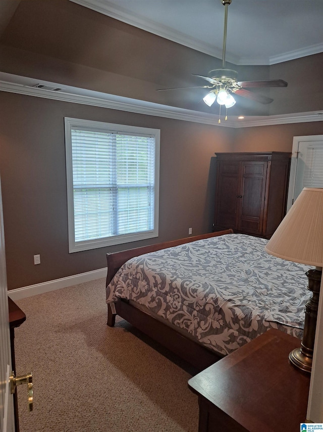 bedroom with ornamental molding, carpet flooring, ceiling fan, and baseboards
