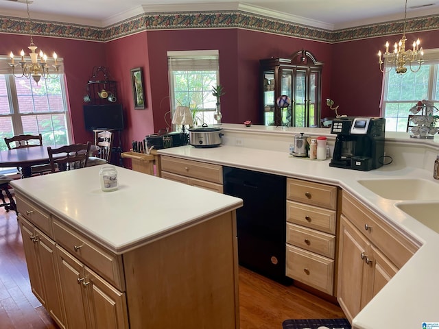 kitchen with decorative light fixtures, dishwasher, wood-type flooring, a center island, and an inviting chandelier