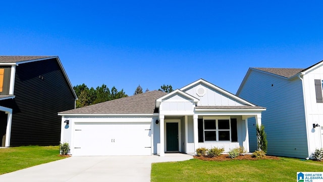 view of front of home featuring a garage and a front yard