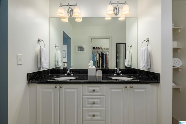 bathroom featuring double vanity