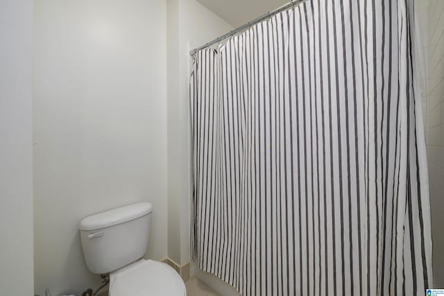 bathroom featuring toilet