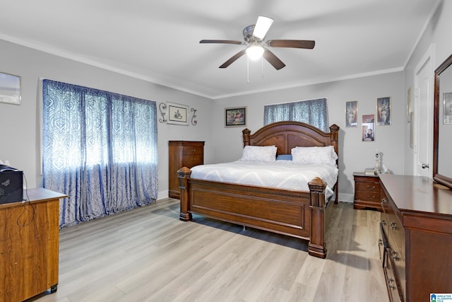 408 N Main St, Graysville, AL 35073 - bedroom with light wood-style flooring, crown molding, and ceiling fan