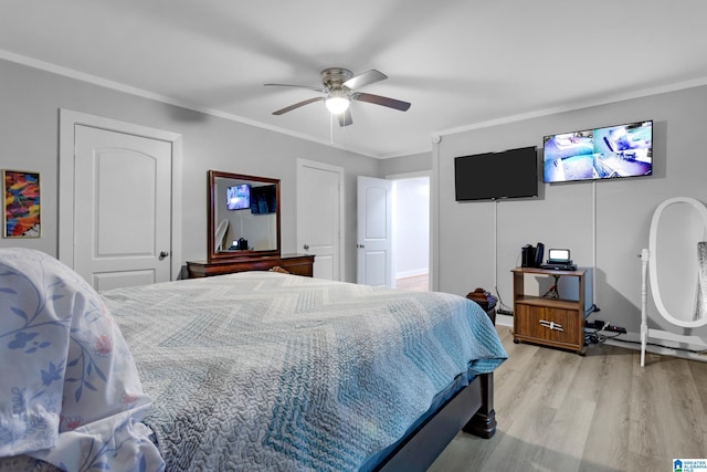 408 N Main St, Graysville, AL 35073 - bedroom with wood finished floors, crown molding, and a ceiling fan