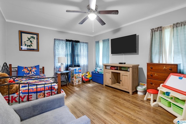 408 N Main St, Graysville, AL 35073 - bedroom with multiple windows, light wood-style flooring, a ceiling fan, and crown molding
