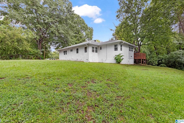 408 N Main St, Graysville, AL 35073 - view of side of home with a yard and stucco siding