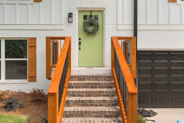 property entrance with a garage