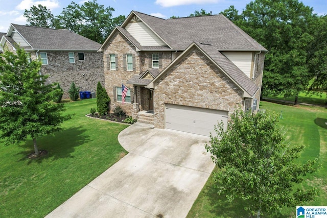 craftsman-style house featuring a garage and a front lawn